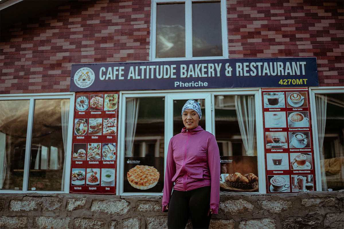 Ang Chhutin Sherpa outside Caf&eacute; Altitude Bakery ready for her morning run